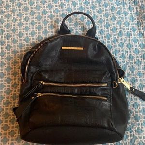 Black Steve Madden mini backpack